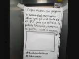 Un cartel en una comunidad de vecinos