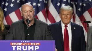 CEO of UFC Dana White speaks as speaksRepublican presidential nominee former President Donald Trump looks on at an election night watch party, Wednesday, Nov. 6, 2024, in West Palm Beach, Fla. (AP Photo/Alex Brandon)