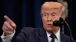 President Donald Trump speaks at a news conference, Monday, March 9, 2026, at Trump National Doral Miami in Doral, Fla. (AP Photo/Mark Schiefelbein)