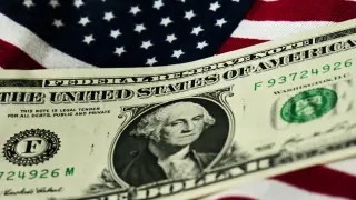 Dólar con bandera de Estados Unidos