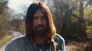 Billy Ray Cyrus en un vídeo musical
