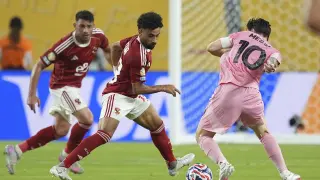 Inter Miami's Lionel Messi, right, dribbles the ball during the Club World Cup group A soccer match between Al Ahly and Inter Miami in Miami, Fla., Saturday, June 14, 2025. (AP Photo/Rebecca Blackwell)