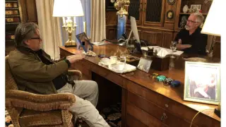 This undated photo released by Democrats on the House Oversight Committee Thursday, Dec. 18, 2025, shows Jeffrey Epstein talking with Steve Bannon. (House Oversight Committee via AP)