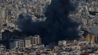 Smoke rises following an Israeli airstrike in Dahiyeh, Beirut's southern suburbs, Lebanon, Monday, March 9, 2026. (AP Photo/Bilal Hussein)