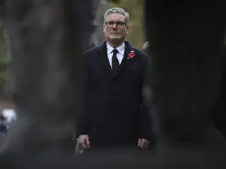 British Prime Minister Keir Starmer attends a ceremony in front of the statue of Winston Churchill near the Champs Elysees avenue, during commemorations marking the 106th anniversary of the WWI Armistice, in Paris, France, Monday, Nov.11 2024. (Christophe Petit Tesson, Pool via AP)