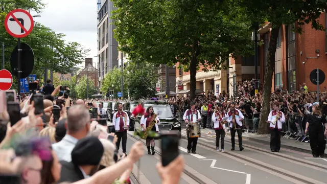 BIRMINGHAM, UNITED KINGDOM - JULY 30: The funeral cortege of Ozzy Osbourne arrives at the Black Sabbath Bridge bench in Birmingham, United Kingdom on July 30, 2025. Ozzy Osbourne, the iconic frontman of Black Sabbath and one of the most towering figure in the history of heavy metal, has died at the age of 76. (Photo by Ioannis Alexopoulos/Anadolu via Getty Images)