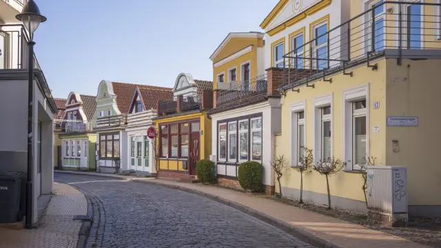Warnemünde, Rostock, Germany - March 3, 2022: Old town in Warnemünde with historic captain's houses during the day.