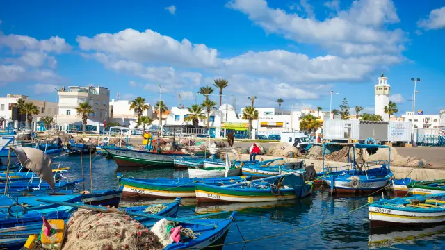 MAHDIA, TUNISIA - DECEMBER 15, 2018: Boats in a fishing port in Mahdia, Tunisia.