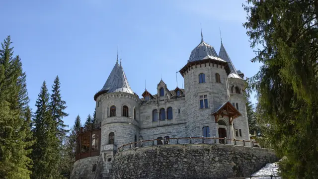 Gressoney-Saint-Jean, Valle d'Aosta region, Italy. 25 April 2018. Castel Savoia, is a villa built in the late 1800s in eclectic style. In a fairytale context, photos of the exterior. Sunny day.