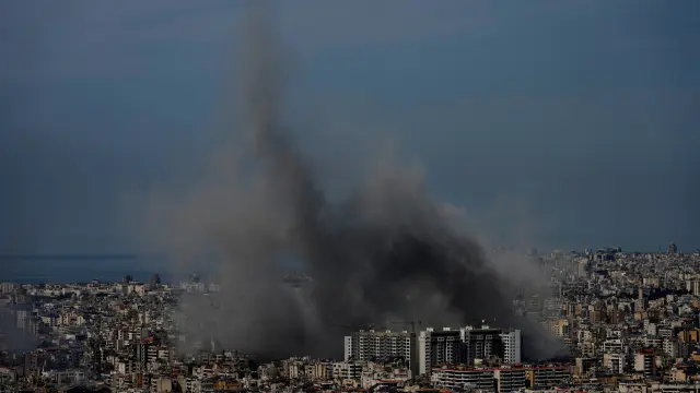 Smoke rises following an Israeli airstrike in Dahiyeh, Beirut's southern suburbs, Lebanon, Friday, March 6, 2026. (AP Photo/Hussein Malla)