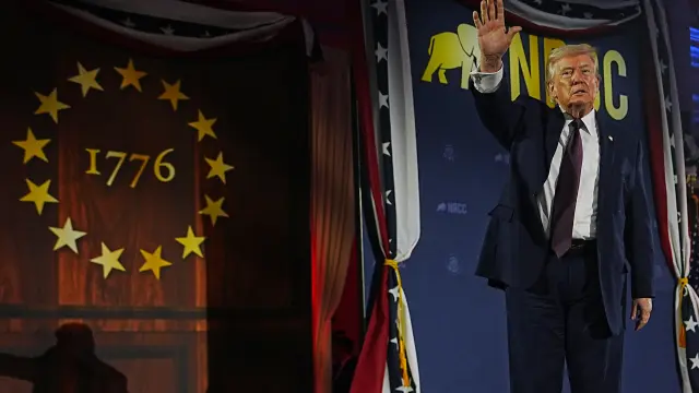 President Donald Trump waves after speaking at the National Republican Congressional Committee's (NRCC) annual fundraising dinner, Wednesday, March 25, 2026, at Union Station in Washington. (AP Photo/Julia Demaree Nikhinson)