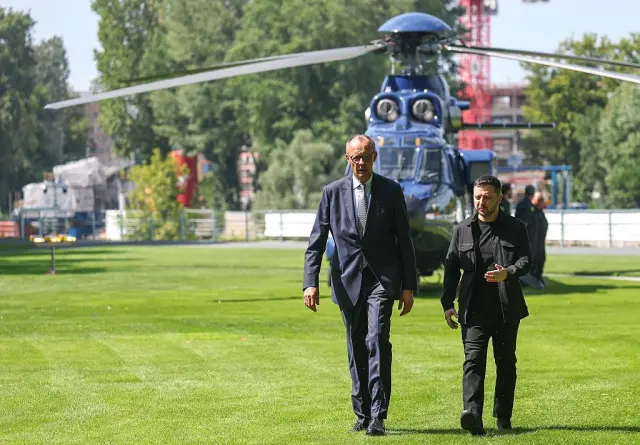 German Chancellor Friedrich Merz (L) welcomes Ukrainian President Volodymyr Zelensky in front of Chancellery in Berlin, Germany, 13 August 2025.