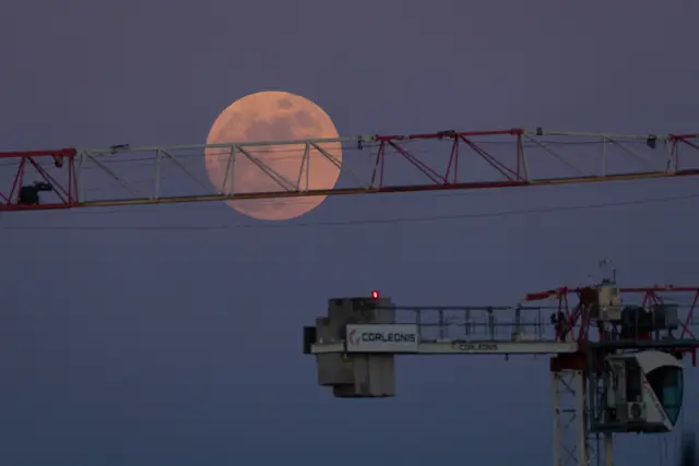 The full moon (Pink Moon) is seen in the evening skies over Warsaw, Poland on 01 April, 2026. (Photo by Jaap Arriens/NurPhoto)