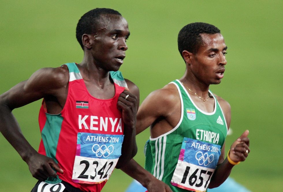 Kipchoge y Bekele, en uno de sus míticos enfrentamientos en los Mundiales.
