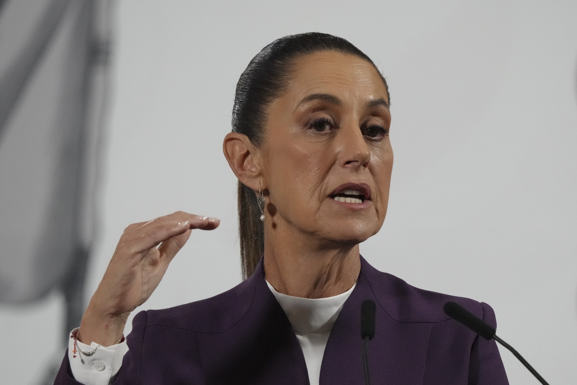 Mexican President Claudia Sheinbaum gives her morning press conference at the National Palace in Mexico City, Tuesday, March 4, 2025. (AP Photo/Marco Ugarte)