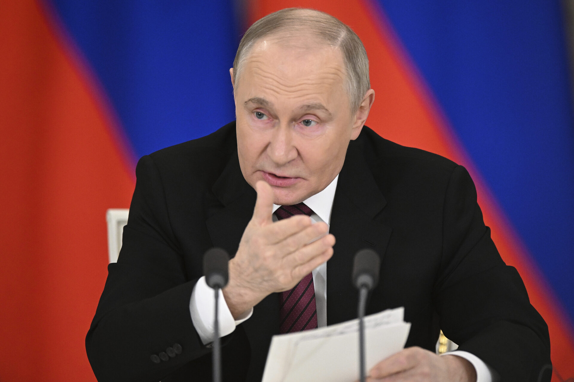 Russian President Vladimir Putin gestures as he speaks to journalists in the Grand Palace at the Kremlin in Moscow, Russia, Sunday, May 11, 2025, after celebrations of the 80th anniversary of the Soviet Union's victory over Nazi Germany during World War II. (Sergei Bobylev/Photo host agency RIA Novosti via AP)
