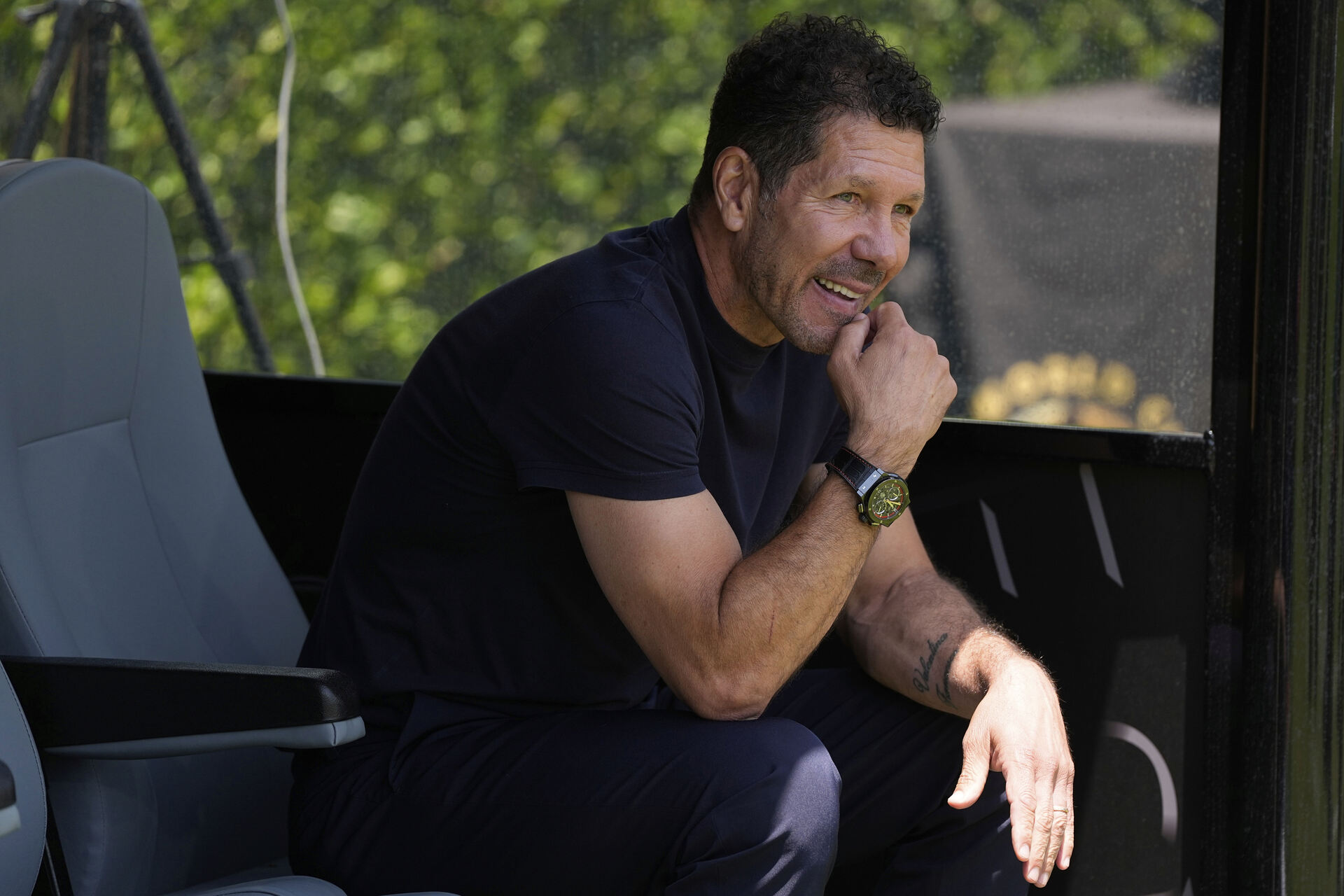 Atletico Madrid manager Diego Simeone sits on the bench during the Club World Cup Group B soccer match between Atletico Madrid and Botafogo in Pasadena, Calif., Monday, June 23, 2025. (AP Photo/Greg Bull)