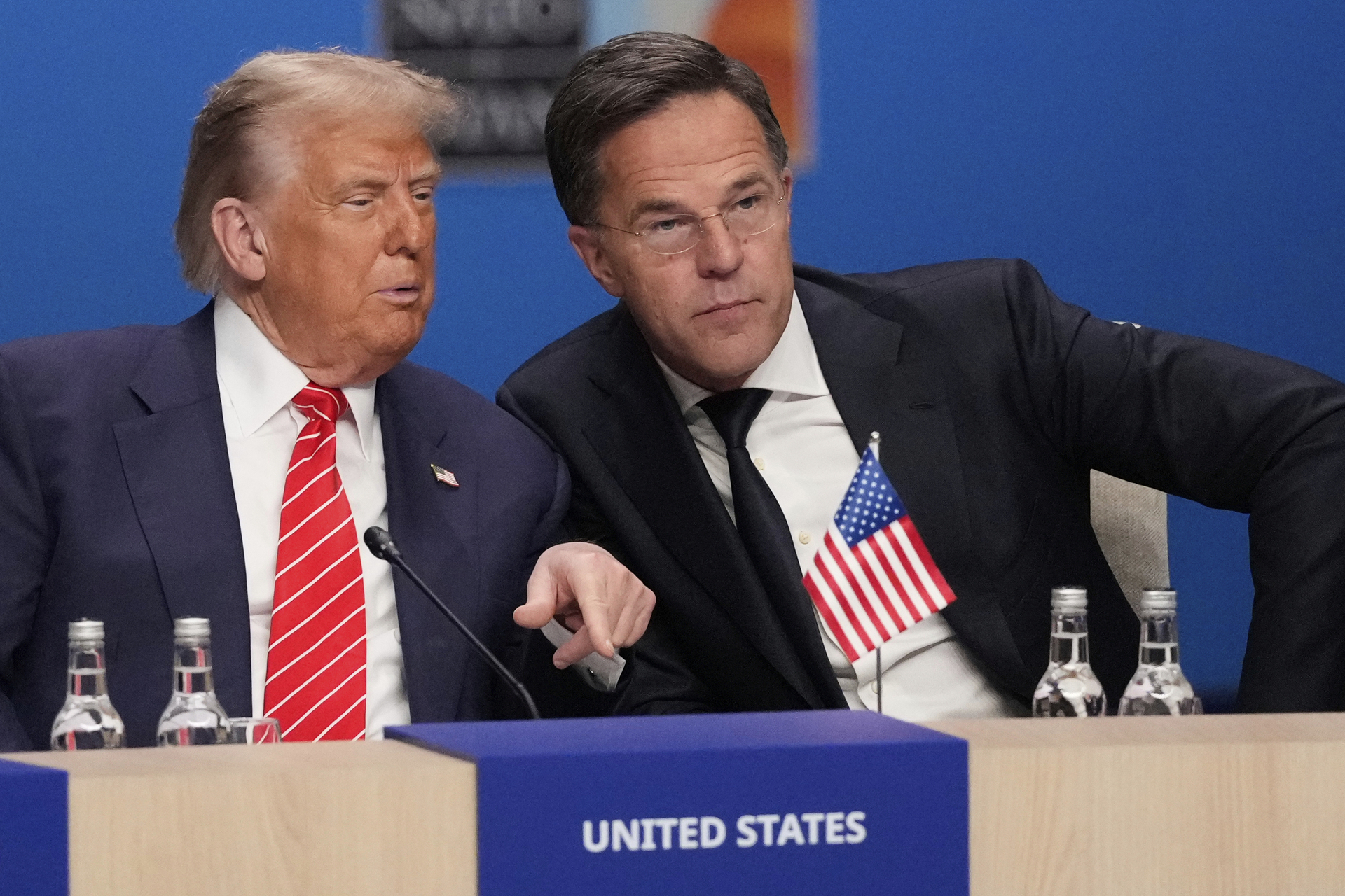 President Donald Trump and NATO Secretary General Mark Rutte attend a plenary session at the NATO summit in The Hague, Netherlands, Wednesday, June 25, 2025. (AP Photo/Matthias Schrader)