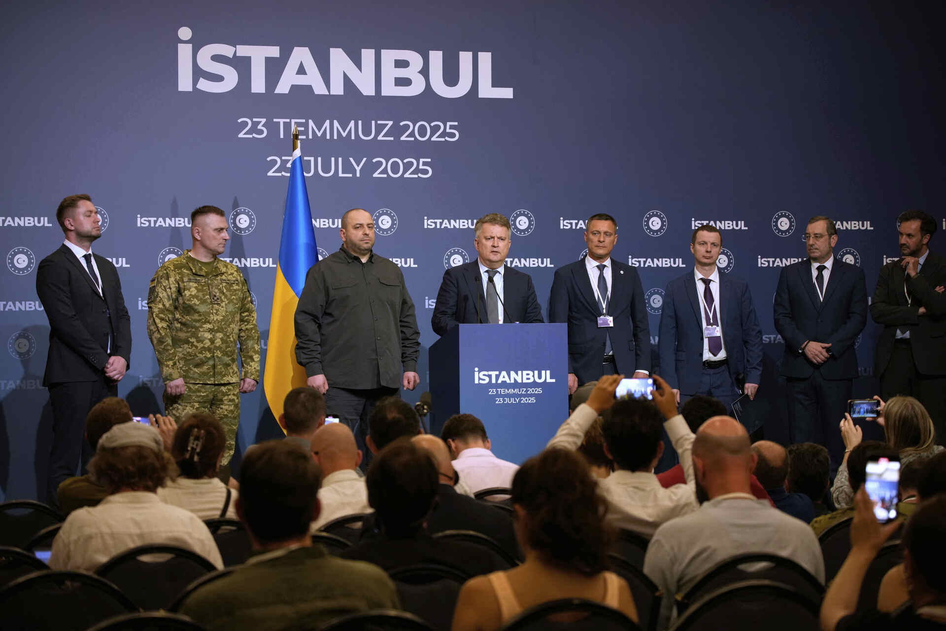 Ukraine's Deputy Foreign Minister Serhii Kyslytsia, fourth left, talks to journalists during a news conference following a meeting between Russian and Ukrainian delegations for peace talks at Ciragan palace, in Istanbul, Turkey, Wednesday, July 23, 2025. (AP Photo/Emrah Gurel)